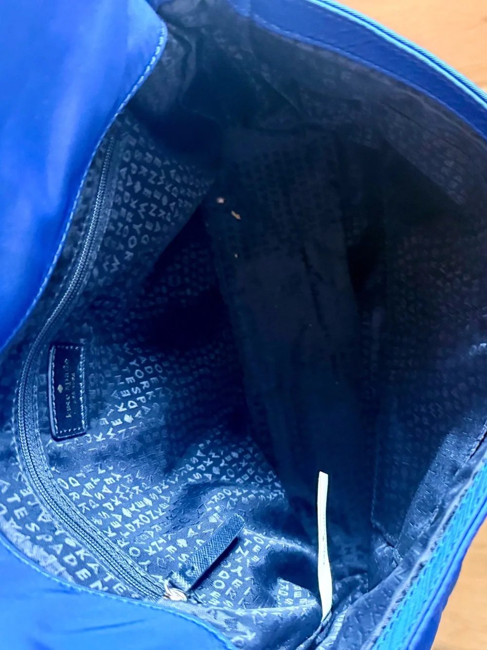 kate spade cobalt blue nylon crossbody with black strap